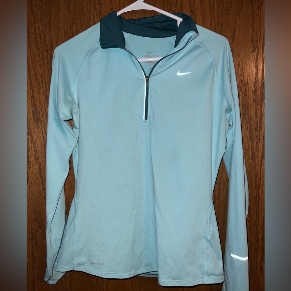 Two 1/2 zip ups